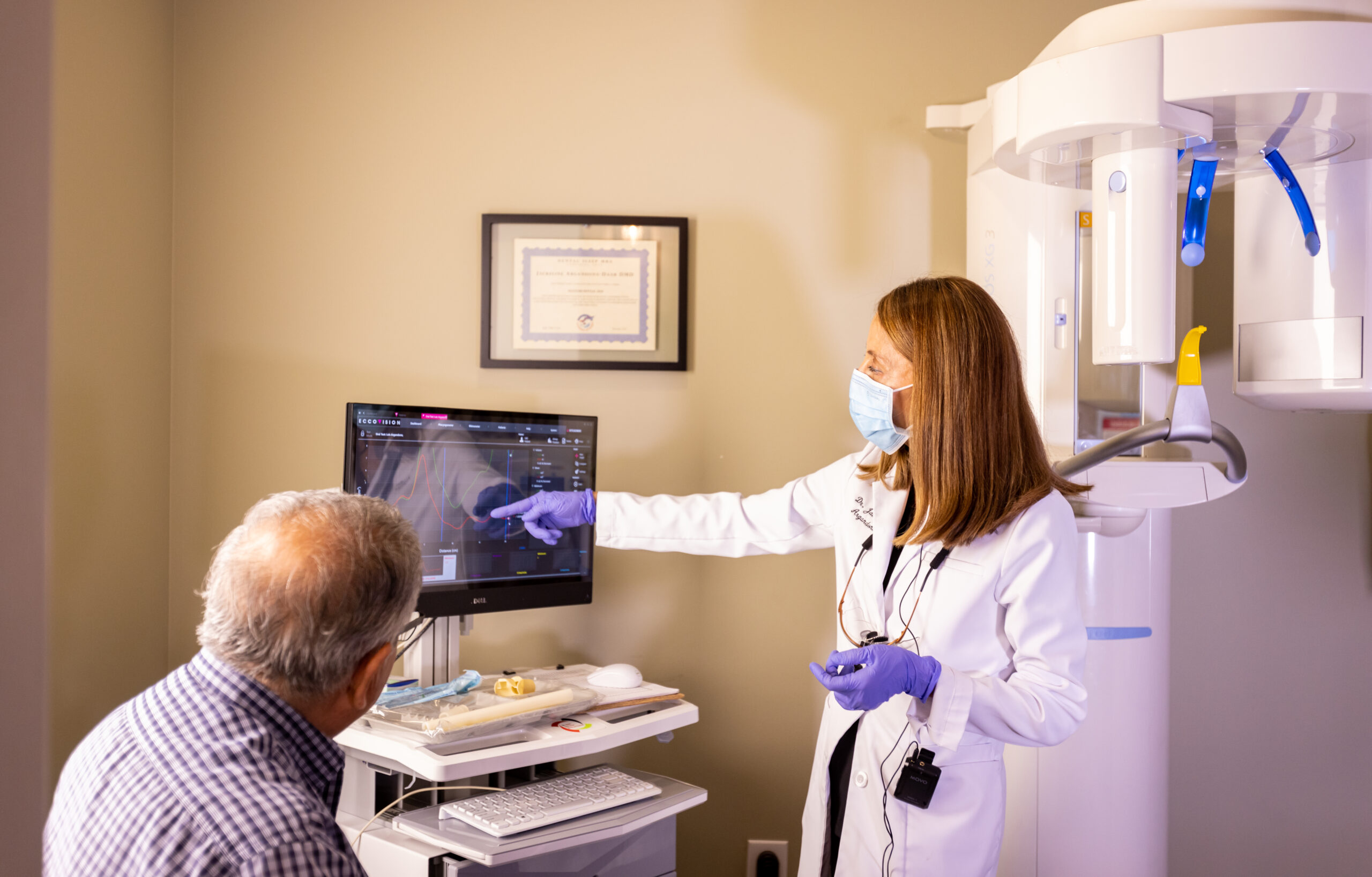 Dentist wearing a mask and a lab coat