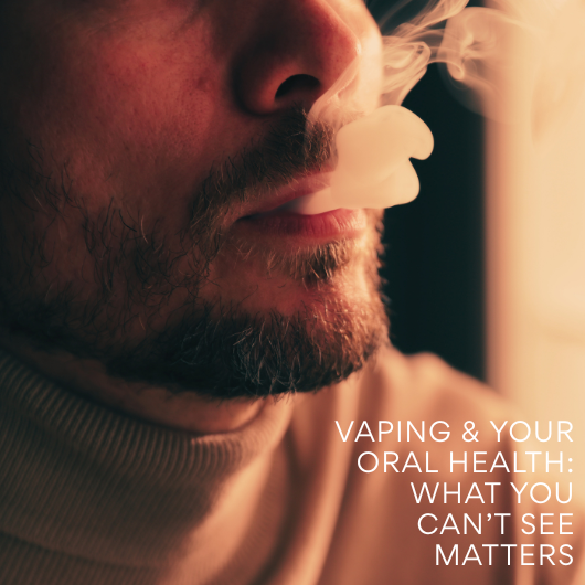 Adult man vaping outdoors in a suburban North Austin home, representing lifestyle habits that can affect oral health and teeth over time